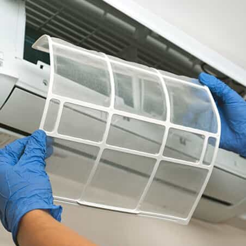 Person checking a filter